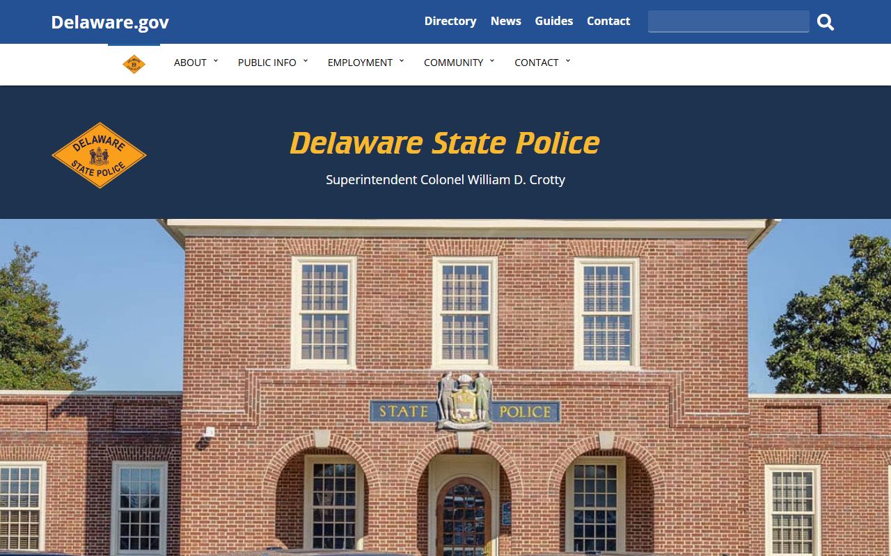 Delaware State Police homepage with warrant records and troop information